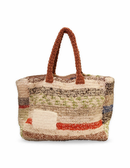 Fitore | stripe crochet cabat with fluffy white pocket