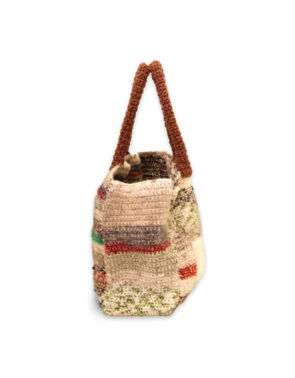 Fitore | stripe crochet cabat with fluffy white pocket