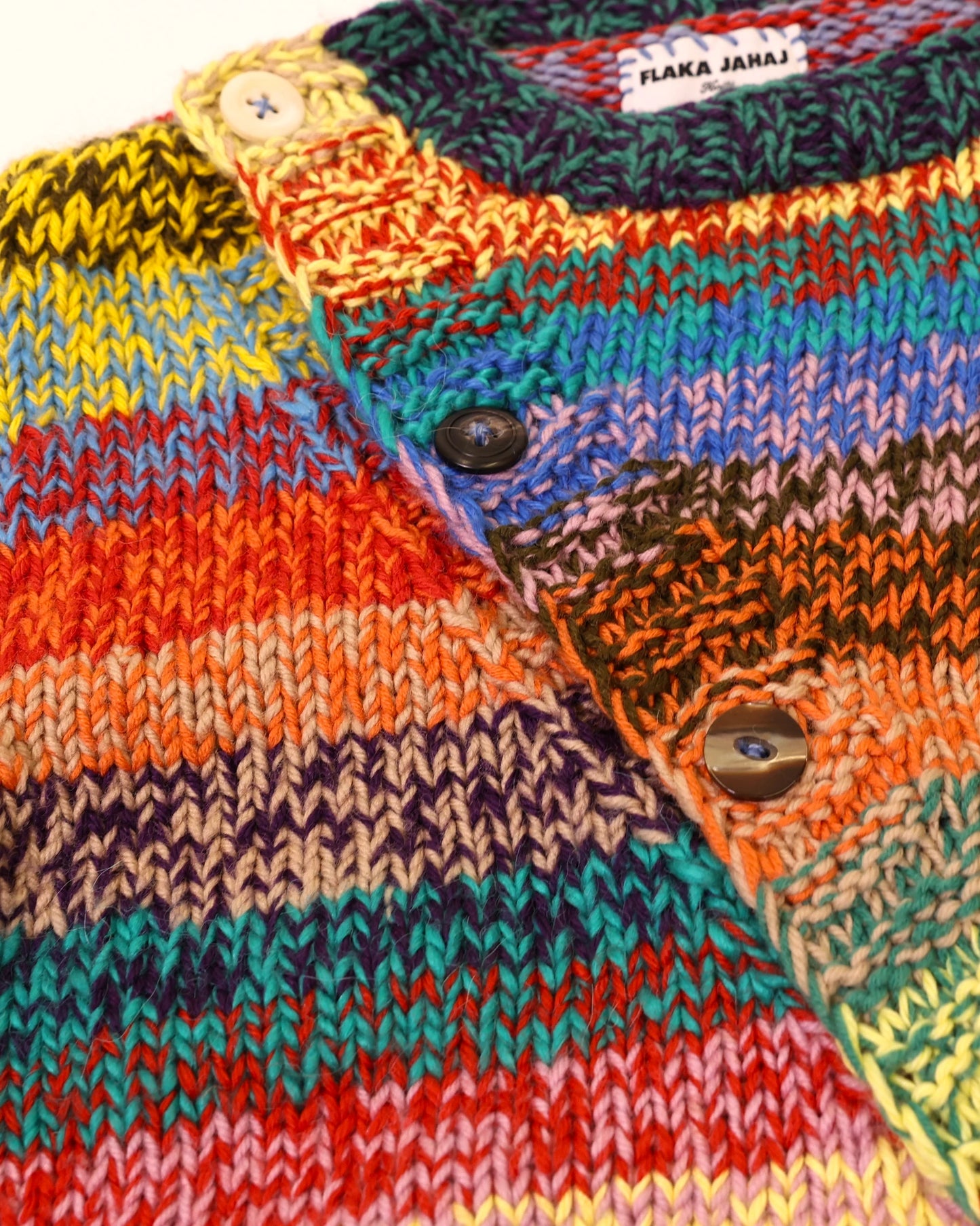 Agnesa | diagonal plain knit cardigan with various buttons